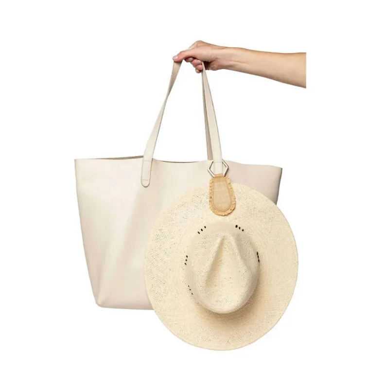 The Raffia Toptote Hat Holders In Natural Gold